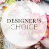 Round floral design with pink and white petals and the words "Designer’s Choice"