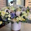 Large pastel bouquet in a pink cylindrical box