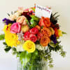 Floral Fiesta is a dazzling, vibrant bouquet bursting with energy and color
