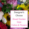 Mixed bouquet of colorful flowers with a designer's choice sign