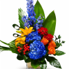 A bold and colorful floral design featuring brilliant blue hydrangeas and delphinium