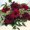 Six beautiful long-stemmed roses in your choice of color with the works.
Please