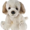 Plush puppy with cream fur and tan ears sitting on a white background
