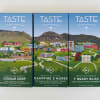 Three boxes of artisan chocolate with illustrated campus scenes