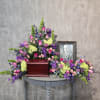 A lush sympathy flower arrangement built for an urn and photo (8x10