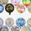 Assorted round birthday balloons with colorful "Happy Birthday" text