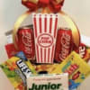 Popcorn bucket gift basket with soda cans and candy