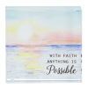 Decorative plaque with a sunrise scene and the words "With faith anything is possible"