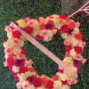 Choose this heart standing wreath for a funeral, celebration of life, or