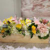 A beautiful low and low style arrangement designed in a wood box