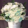 50 White and light blue roses 
Blue and White Hydrangeas
White Orchid
Greens