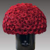 Large dome of red roses in a black cylindrical box