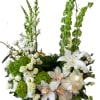 White floral arrangement with lilies, roses, and orchids