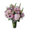 Pink and white mixed bouquet in a tall green vase
