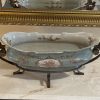 Beautiful Porcelain Centerpiece Cachepot with bronze handles and legs and beautiful detailing.
Excellent