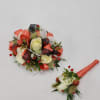 Select this coral themed boutonniere and corsage set featuring spray roses, bunny