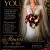 Deep red roses paired with creamy white calla lilies create a compact