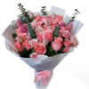 Pink rose bouquet with tulips and eucalyptus wrapped in white paper