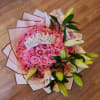 Pink rose bouquet with lilies and a jeweled tiara