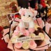 Plush teddy bear bouquet with pink and cream roses