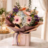 Es un bouquet elegante de un tamano moderado, es diferente al resto