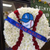 DODGERS STANDING SPRY WITH A COSTUMIZED BLUE RIBBON WITH A PHRASE OF