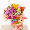 Celebrate with this vibrant  flower arrangement, beautifully designed in a clear