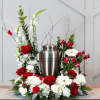 A mix of red and white seasonal blooms and red cardinals are