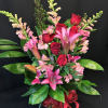 Pungent sweet smelling lilies, our premium Long stem red roses, and a