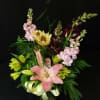Just some sweet blossoms and seasonal flowers in a vase. Selection and