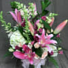 Fragrant luscious lilies in combination with pretty feminine flowers suitable for a