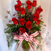 Our rose arrangements are so fresh, we don't arrange them until you
