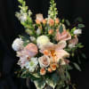 Shades of romance and blushing color. Premium flowers such as Dahlia, roses