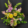 Mixed bouquet with yellow lilies, purple mums, and pink flowers