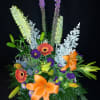 Sweet seasonal flowers in floral foam can be easily transported home by