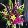 Stunning and Tall, this exotic arrangement is full of exquisite flowers you