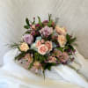 This perfect sized posie will be sure to enhance your Prom!