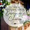 Funeral standing spray with white, yellow, purple, and pink flowers