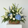 A sympathy arrangement in a basket is a warm and comforting expression