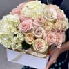 Beautiful bouquet in a combination of hydrangea and delicate roses .Great for