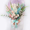 Large pastel bouquet with dried flowers and a satin ribbon