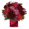 Pure passion. Bedazzle your beloved with luscious red and lavender roses in