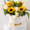 Sunflower and white rose arrangement in a white hatbox with a ribbon