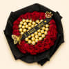 Red rose bouquet with gold-wrapped chocolates and a black ribbon