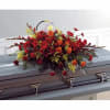 Honor a loved one with our Fall Casket Spray, a beautiful funeral