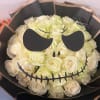 Straight from Halloween Town! This charming bouquet is made with elegant white