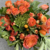 Monochromatic orange and green. This is a statement piece for the person