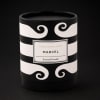 Black and white scented candle in a decorative container
