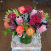 Celebrate someone radiant with a Golden Hour flower arrangement-an energetic bouquet perfect