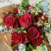 Bouquet of red roses with eucalyptus and greenery